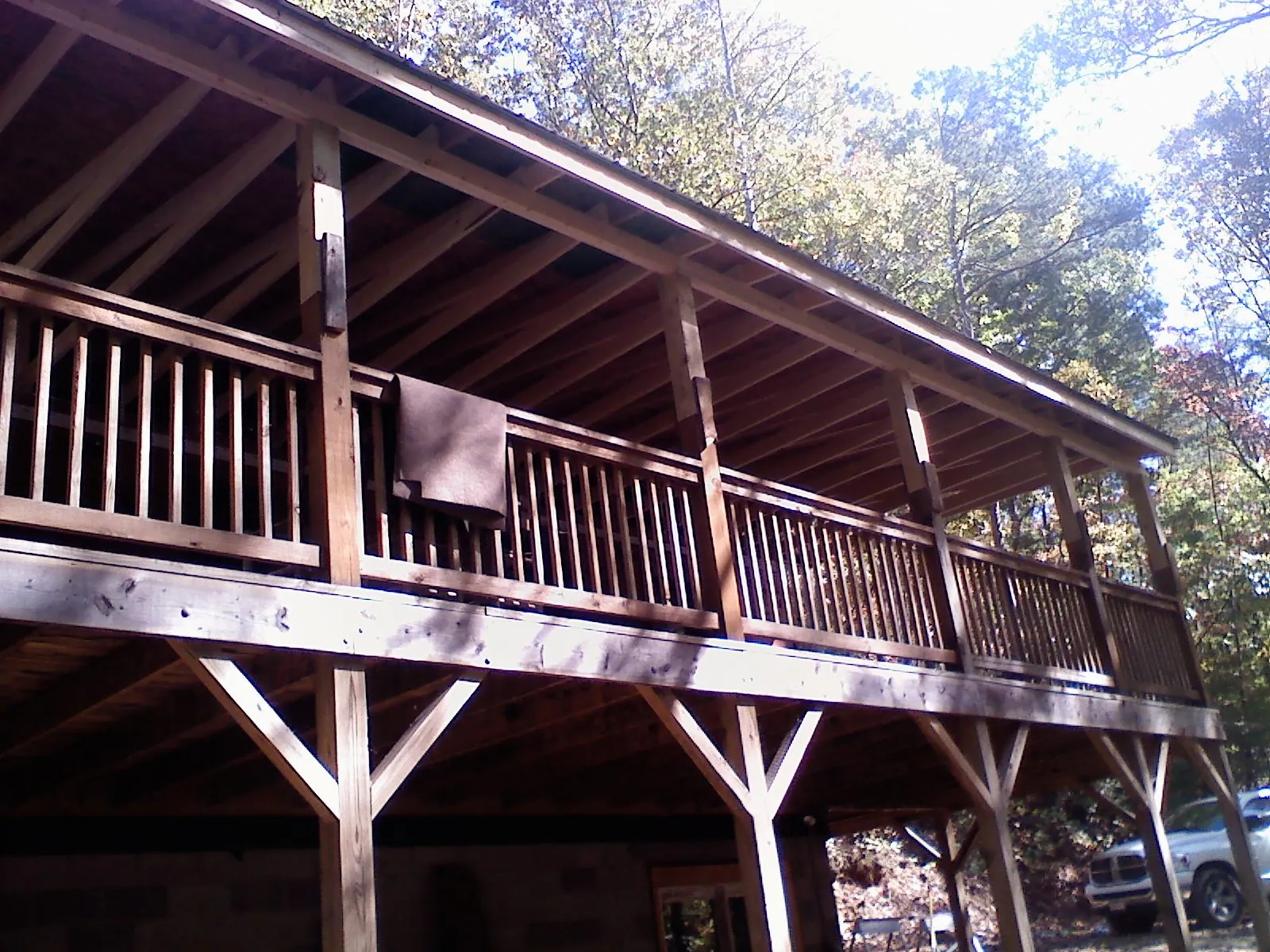 Timber framing under a new elevated porch and deck — Roof Leak Repair in Neptune by Roofing Brothers